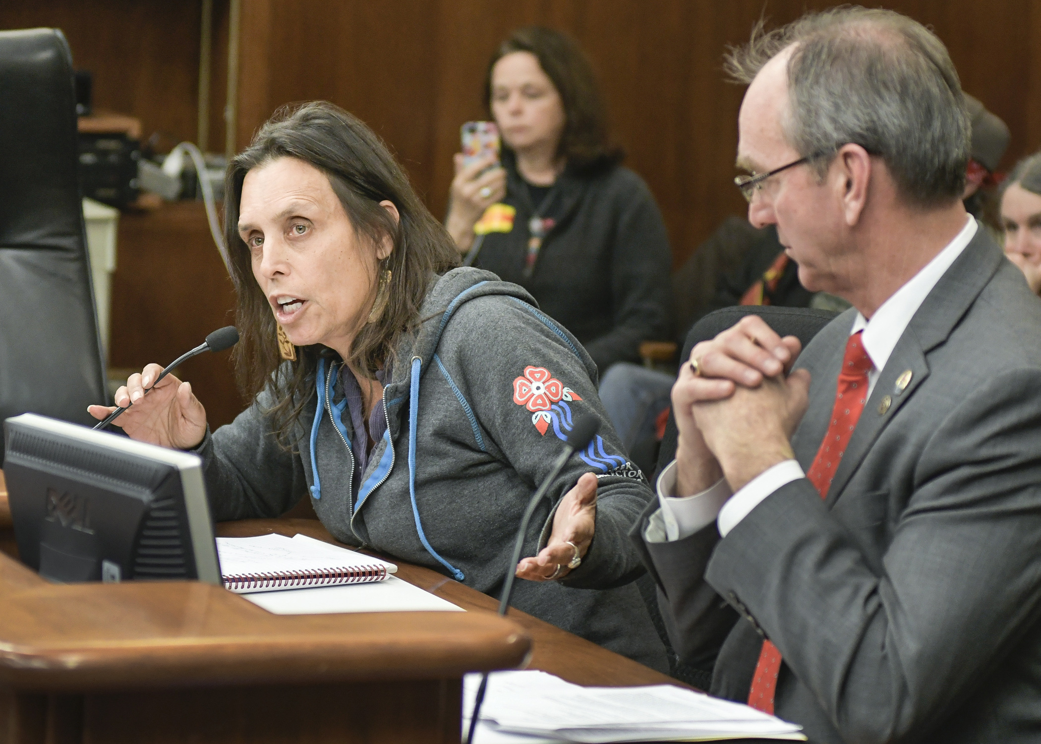 Environmentalist Winona LaDuke testifies before the House Job Growth and Energy Affordability Policy and Finance Committee March 27 in opposition to a bill sponsored by Rep. Dan Fabian, right, that would authorize pipeline construction and routing. Photo by Andrew VonBank